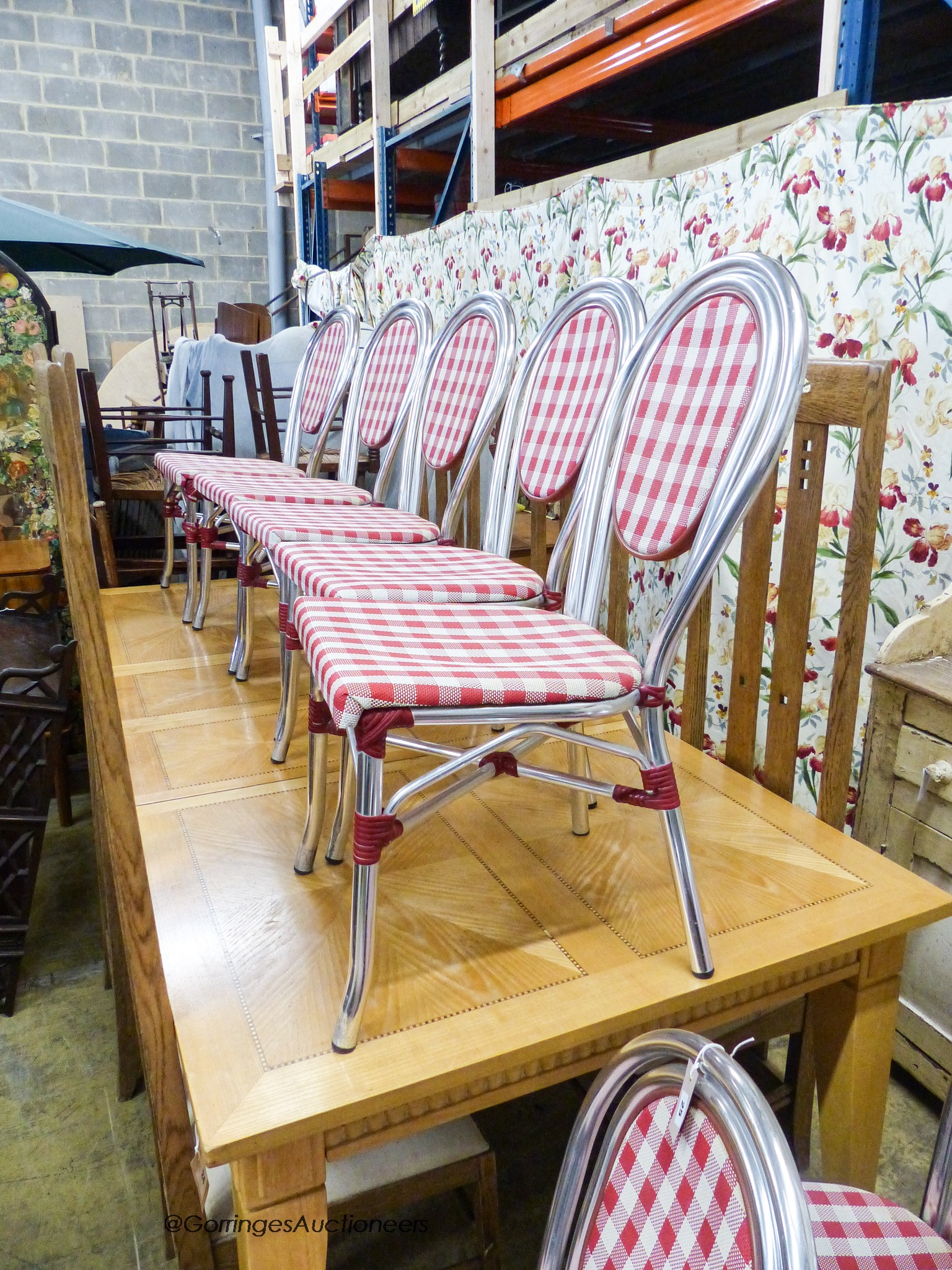 A set of ten retro aluminium bistro chairs